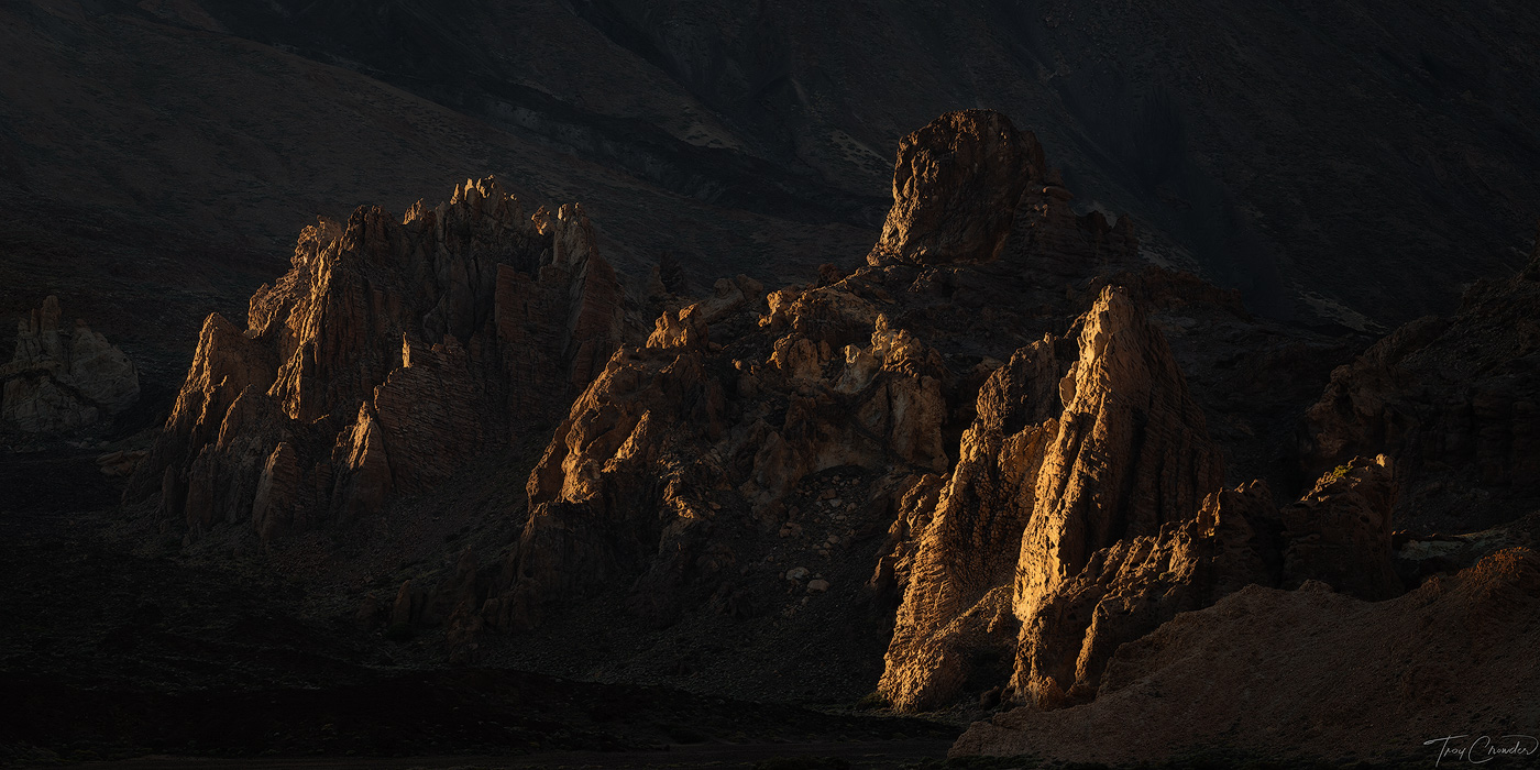 Last light of the day lands upon the spires of the Roques del Teide.